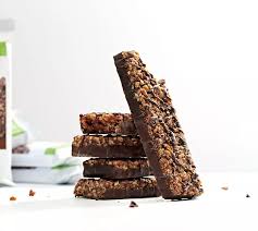 deliziose barrette sostituto pasto herbalife formula 1 express dark cioccolato Essere in giro non significa rinunciare alla nutrizione. La barretta Formula 1 Express è un modo delizioso per gustare un pasto equilibrato e nutriente sempre e ovunque.*  Ricca di proteine di qualità e vitamine e minerali chiave, questa deliziosa barretta rende più facile che mai tenere il passo con i tuoi obiettivi nutrizionali.